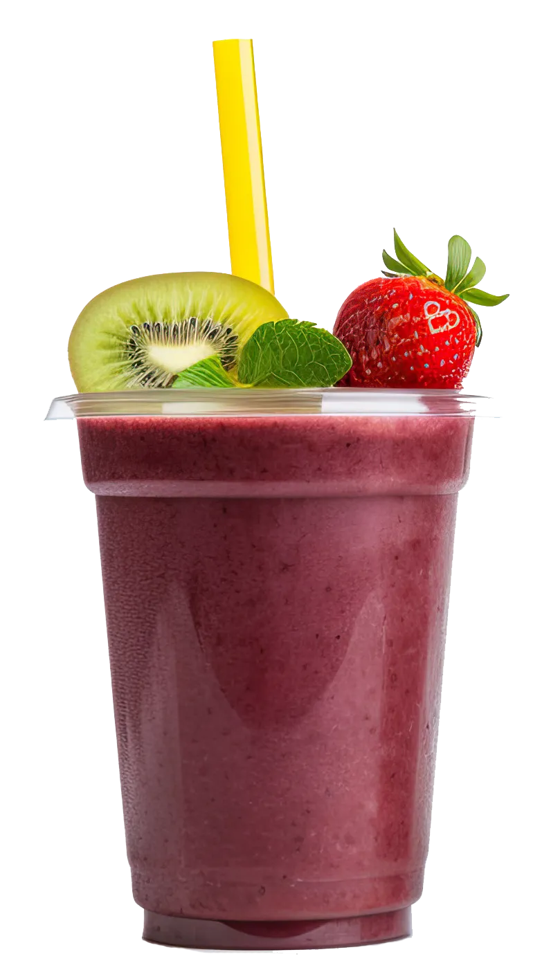 A refreshing berry smoothie in a cup, topped with kiwi, a strawberry, mint leaves, and a yellow straw.