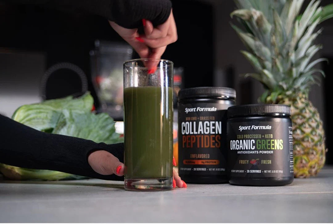 Pouring organic greens and collagen peptides into a glass.