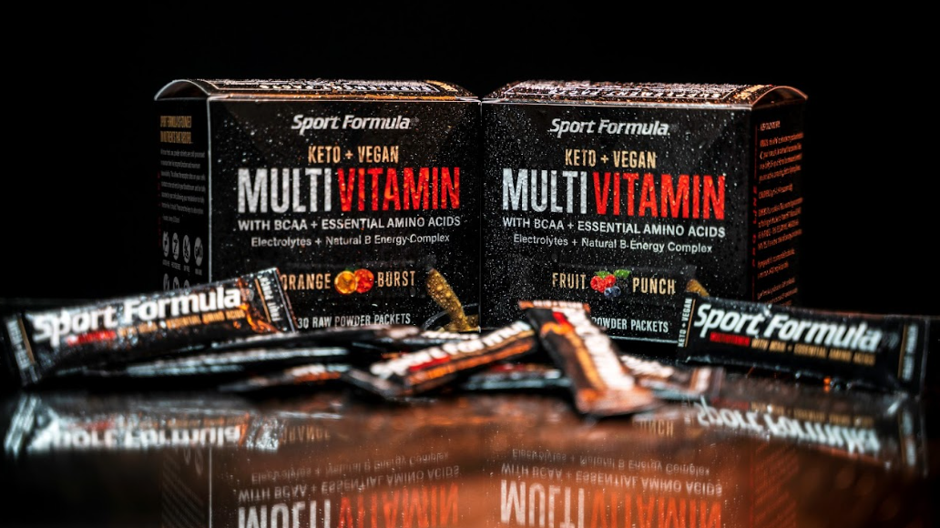 Image of two types of multivitamin packets: Fruit Punch and Orange Burst.