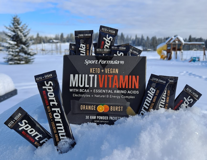 Image of multivitamin packets in the snow.