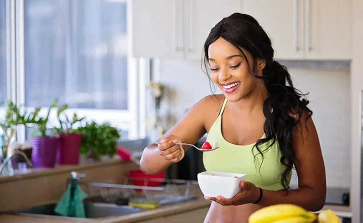 A woman eating healthy food.