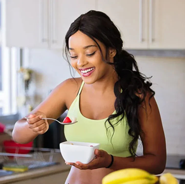 A woman eating healthy foods