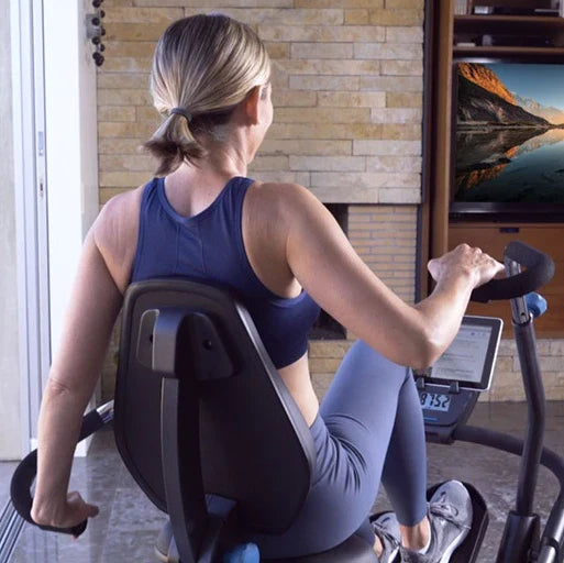 A woman doing TV exercises