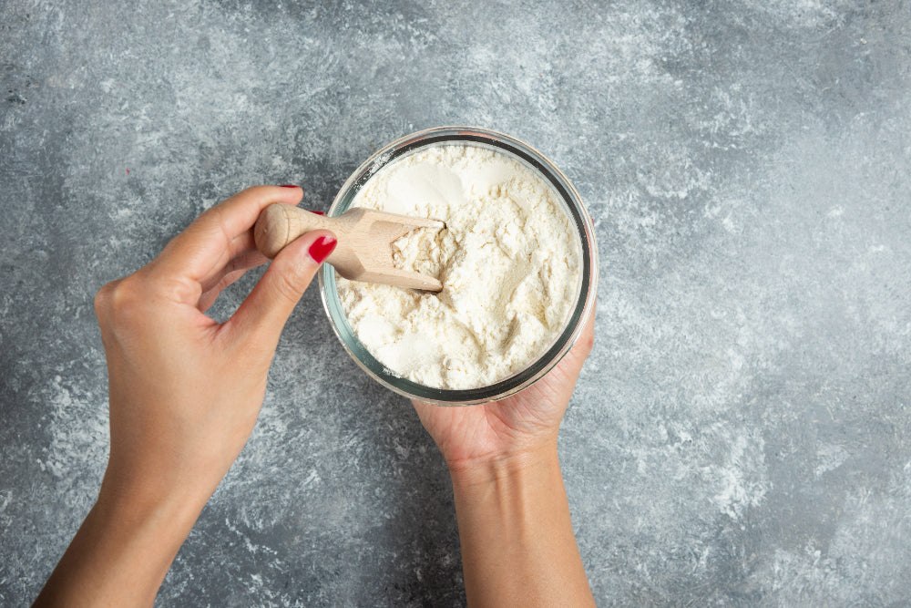 A container of powdered vitamins labeled as free from additives and fillers, showcasing the benefits of a clean and pure supplement option.